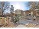 Backyard view of patio with pond and pergola at 10826 Livingston Dr, Northglenn, CO 80234