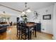 Cozy dining area seamlessly connected to the living room, perfect for entertaining guests and enjoying meals at 10826 Livingston Dr, Northglenn, CO 80234