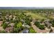A view of a community featuring well-maintained homes, walking paths and green space at 2249 Weatherstone Cir, Highlands Ranch, CO 80126