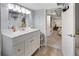 Bright bathroom featuring a vanity with white countertop, and a fun basketball hoop at 2249 Weatherstone Cir, Highlands Ranch, CO 80126