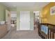 Bright room with a crib, closet and doorway leading to the bathroom and hallway at 2249 Weatherstone Cir, Highlands Ranch, CO 80126