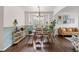 Spacious dining room with hardwood floors, natural light and contemporary decor at 2249 Weatherstone Cir, Highlands Ranch, CO 80126
