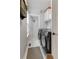 Efficient laundry room featuring modern washer and dryer units with white tile floors at 2249 Weatherstone Cir, Highlands Ranch, CO 80126