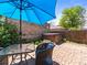 Backyard with an outdoor seating area, a hot tub, and a privacy fence at 3015 N Fillmore St, Denver, CO 80205