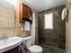 Updated bathroom features decorative tile, a glass shower, and modern fixtures at 3015 N Fillmore St, Denver, CO 80205