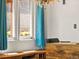 Bright dining nook with wooden bench and chandelier at 3015 N Fillmore St, Denver, CO 80205