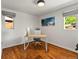 Bright office with hardwood floors and a modern desk at 3015 N Fillmore St, Denver, CO 80205