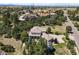 Aerial view of a beautiful home surrounded by mature trees in a desirable neighborhood at 6398 Lost Canyon Ranch Rd, Castle Rock, CO 80104