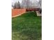 Green backyard showcasing a well-manicured lawn and beautiful outdoor space at 11821 W Independence Ave, Lakewood, CO 80401