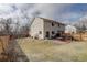 Expansive backyard with patio, offering ample space for recreation and outdoor activities at 11821 W Independence Ave, Lakewood, CO 80401
