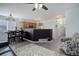 Dining area that has a breakfast bar, dining table with dark wood chairs, and modern lighting at 11821 W Independence Ave, Lakewood, CO 80401