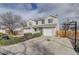 Delightful townhouse with a single car garage and a well manicured lawn at 11821 W Independence Ave, Lakewood, CO 80401