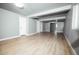 Expansive finished basement with wood-look floors and plenty of open space at 18656 E Harvard Dr, Aurora, CO 80013