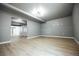 Versatile finished basement with recessed lighting and ample room for entertainment at 18656 E Harvard Dr, Aurora, CO 80013