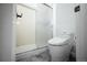 Bathroom featuring a modern toilet and glass-enclosed shower at 18656 E Harvard Dr, Aurora, CO 80013
