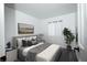 Comfortable bedroom with a plush bed, soft lighting, and stylish decor, creating a relaxing atmosphere at 18656 E Harvard Dr, Aurora, CO 80013