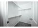 Walk-in closet with shelving and rod for optimal storage at 18656 E Harvard Dr, Aurora, CO 80013