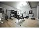 A fully equipped home gym with state-of-the-art equipment for a complete workout experience at 18656 E Harvard Dr, Aurora, CO 80013