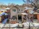 Two-story house with stone accents and a landscaped yard, viewed from above at 1460 S Emerson St, Denver, CO 80210