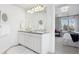 Elegant bathroom with double vanity and a large mirror at 1460 S Emerson St, Denver, CO 80210