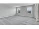 Spacious bedroom with neutral carpet, light walls, and natural lighting at 7977 S Kittredge St, Englewood, CO 80112
