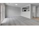 Spacious living room area that opens to the kitchen, providing a bright and airy feel at 7977 S Kittredge St, Englewood, CO 80112