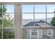 A window provides an amazing view of mountains and nearby houses at 7158 Torrey St, Arvada, CO 80007