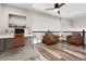 Upstairs bonus room with natural lighting and stylish furniture at 6424 S Routt St, Littleton, CO 80127