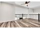Open bonus room space with stylish floors at 6424 S Routt St, Littleton, CO 80127