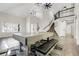 Open living space featuring a staircase, new hardwood floors, and a dining table with seating at 6424 S Routt St, Littleton, CO 80127