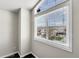 Bright window with a view of the neighborhood and green lawn at 6424 S Routt St, Littleton, CO 80127