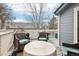 Outdoor deck with wicker seating and a propane fire table, perfect for relaxation at 4644 W 112Th Ct, Westminster, CO 80031