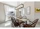 Well-lit dining area with decorative accents, modern lighting, and space for entertaining at 4644 W 112Th Ct, Westminster, CO 80031