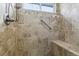 Tiled walk-in shower featuring a grab bar, shower head, bench, and window at 4644 W 112Th Ct, Westminster, CO 80031