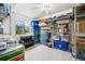 Storage room with wire shelving and boxes and a window that offers scenic views at 4644 W 112Th Ct, Westminster, CO 80031