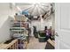 Organized storage room with metal shelving units filled with boxes, baskets, and various items at 4644 W 112Th Ct, Westminster, CO 80031