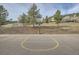 Outdoor basketball court on a sunny day, perfect for recreation and enjoying outdoor activities at 23678 Pondview Pl # D, Golden, CO 80401