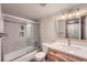Modern bathroom features a vanity with a white countertop and a glass-enclosed shower at 23678 Pondview Pl # D, Golden, CO 80401