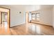 Bright and airy bedroom featuring hardwood floors, large windows, and an open layout at 23678 Pondview Pl # D, Golden, CO 80401