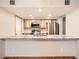 Well-lit kitchen featuring stainless steel appliances and granite countertops at 23678 Pondview Pl # D, Golden, CO 80401