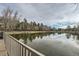 Scenic pond view with reflections, creating a peaceful and picturesque environment at 23678 Pondview Pl # D, Golden, CO 80401