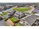 An aerial view of a community showcasing well-maintained lawns and neighborhood amenities at 16308 Saint Paul St, Thornton, CO 80602