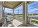 Inviting front porch with views of the landscaped neighborhood at 16308 Saint Paul St, Thornton, CO 80602