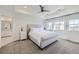 Serene main bedroom features neutral tones, plush carpet, and large windows for plenty of natural light at 16308 Saint Paul St, Thornton, CO 80602