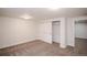 Finished basement bedroom with double door closet and neutral decor at 2030 Santana Dr, Castle Rock, CO 80104