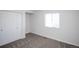 Simple bedroom with neutral wall and carpet at 2030 Santana Dr, Castle Rock, CO 80104