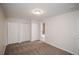 Spacious bedroom with neutral carpeting and ample closet space at 2030 Santana Dr, Castle Rock, CO 80104