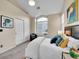 Bedroom featuring carpet flooring, a window seat, and plenty of natural light at 1358 Carlyle Park Cir, Highlands Ranch, CO 80129