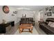 View of the living room featuring a comfortable leather sofa, and modern decor at 534 E 7Th Ave # 206, Denver, CO 80203