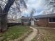 Charming single-story brick home with a well-maintained yard and inviting entryway at 2109 Jackson St, Golden, CO 80401